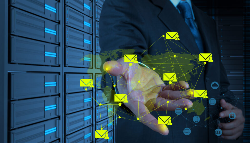 Businessman working with the new computer interface sending email as network concept.